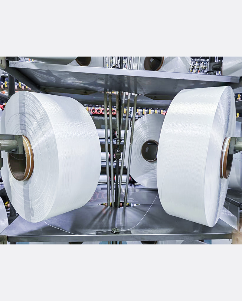 টেক্সটাইল বর্জ্য কমাতে পুনর্ব্যবহৃত FDY সুতার ভূমিকা কী?